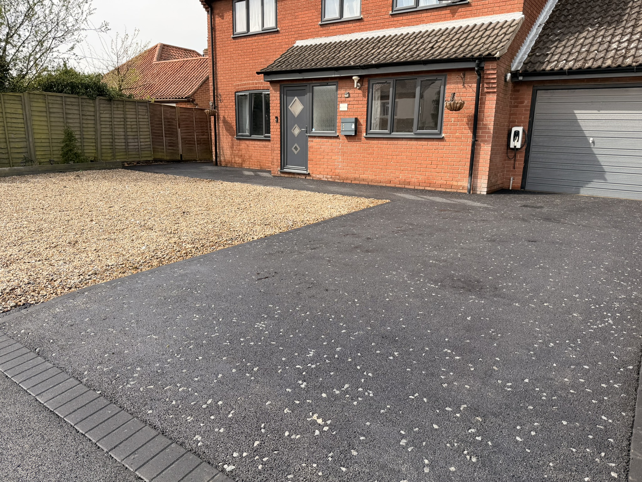Grey-fleck tarmac driveway