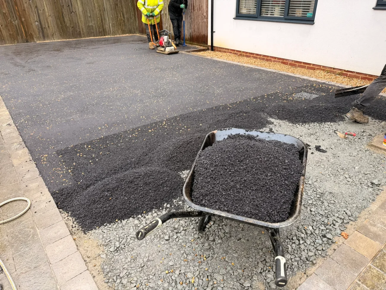 Detail of shingle-dressed tarmac driveway in Colkirk